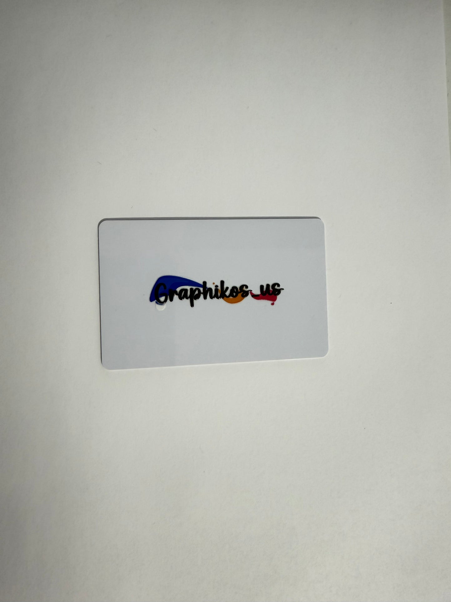 Card with colorful text design on a white or black background